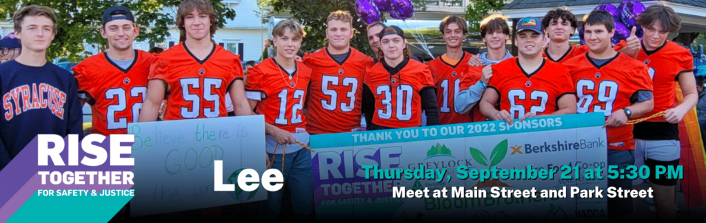 Image of Rise Together Lee with the Lee High football team in their orange jerseys holding a sign.
